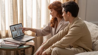 a man and woman sitting on a couch