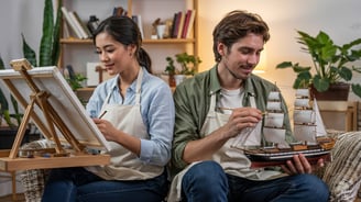 a man and woman sitting on a couch in a living room