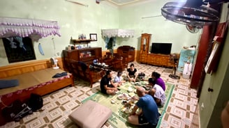 a group of people sitting around a table