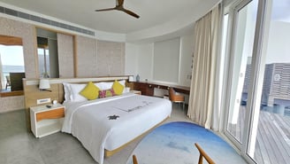 Jumeirah Olhahali Island Maldives overwater villa bedroom