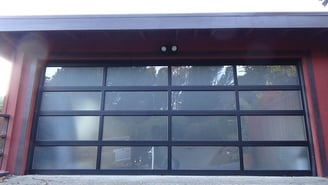 Clearview all glass garage door black frame.