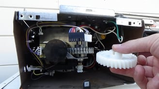 Garage door opener gear replacement