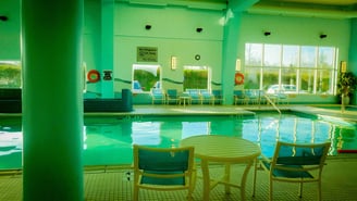 pool angle with a pillar and bottom of a waterslide