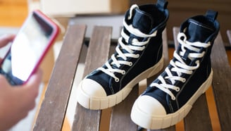 a pair Converse All Star sneaker
