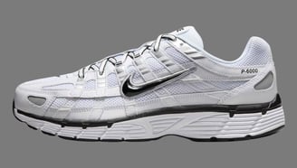 a pair of white sneakers Nike P-6000