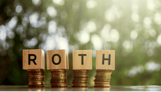 gold coins and blocks spelling roth ira