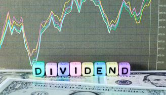 chart and dollar bills representing dividends