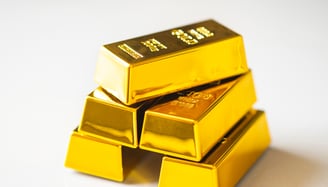 gold bullion bars in a pyramid