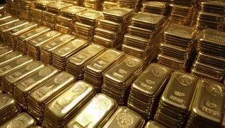 a bunch of gold bullion bars