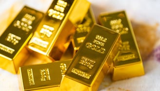 gold bars as a tangible asset example for investing