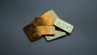 pile of gold wafers for gold volatility blog post