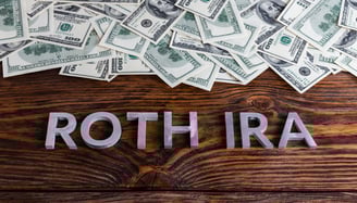lots of money in a pile for the word roth ira
