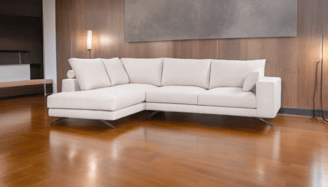 a white couch with a large white couch and a lamp