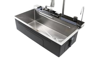 a stainless steel sink with multifunctional faucet set