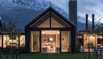 a house with a view of a mountain in the background