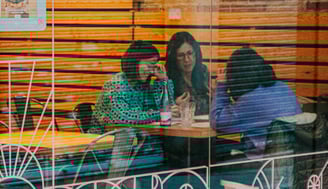 Customers enjoying the cosy interior of Santa Lola Santa Coloma