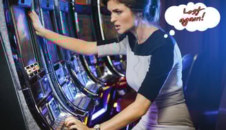 a woman playing a slot machine