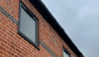 clean window on a house in ledbury