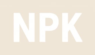 Image of bold white letters 'NPK' on a neutral background, representing nutrients in fertilizer.