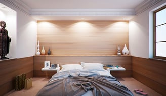 a bedroom with a bed in the middle of the room