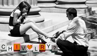 a man helping a woman put her shoe on