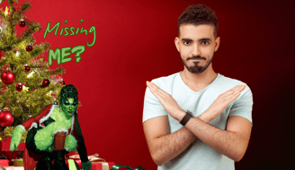 a man with a christmas tree and a woma dressed up as the grinch