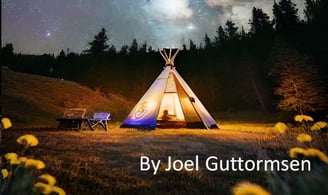 Teepee in a mountain meadow with milky way