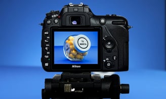DSLR camera in blue background