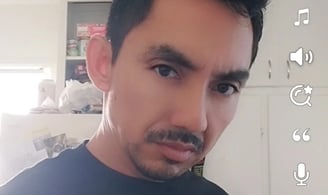 a man with a mustache and mustaches on his face