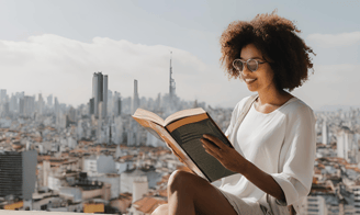 Black woman Digital Nomad reading a book with Bangkok cityscape in the background