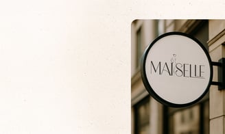 Storefront signage showcasing fashion brand identity. By UrBrand Studio.
