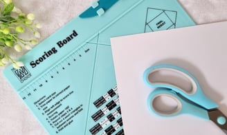tutorial about how to use scoring board and corner punch to make an envelope