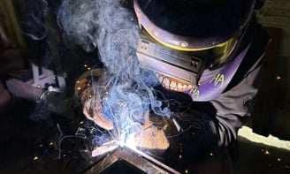 jaspar schirmer welding a steel beam