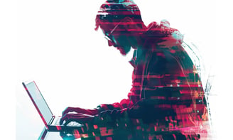 A man copywriting on a laptop in pink red blue and black tones.