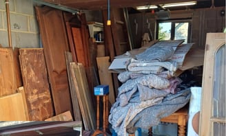 waste inside a garage in a worcester home