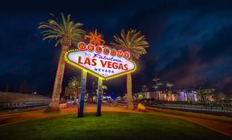 a large sign that says welcome to the las vegas sign