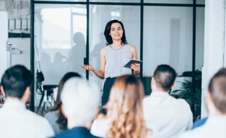 a qualified accountant presenting financial data to a board of directors