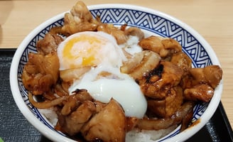 Soft boiled egg chicken rice at Nakau