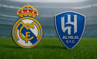escudos de real madri e al hilal sobre um gramado