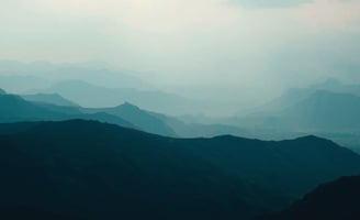 UniverseX - a mountain range with a view of the mountains