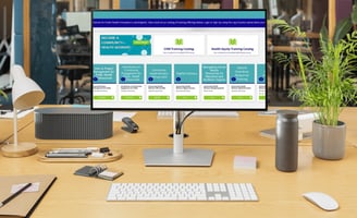 a computer monitor screen showing a desktop computer monitor and keyboard