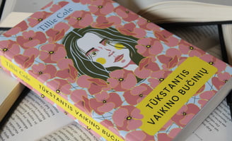 a book with a pink cover and a book with a picture of a woman '