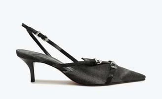 a woman's shoes with a bow tie