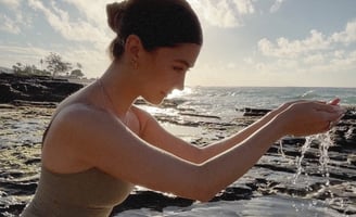 Woman holding healing water