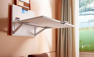 white foldable desk in living room