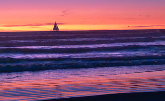 Sailing at sunset in Oceanside, California