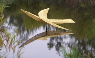 Pond Bird, floating sculpture by Jeff Hackney