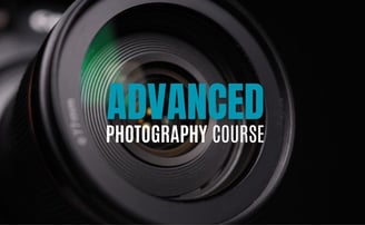 Close-up of a camera lens with text “Advanced Photography Course” overlayed.