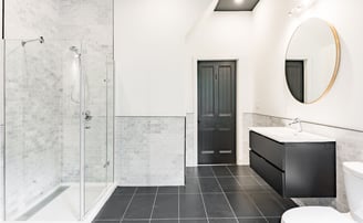 a large master bath with marble back-splash renovation in Toronto by Home Reno Pro