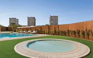 Heated outdoor pool and kids pool at Wyndham Residences Alvor Beach